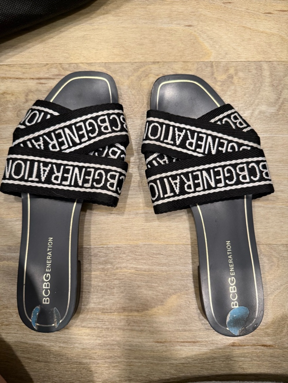 BCBGeneration Black and White Logo Crisscross Slide Sandals